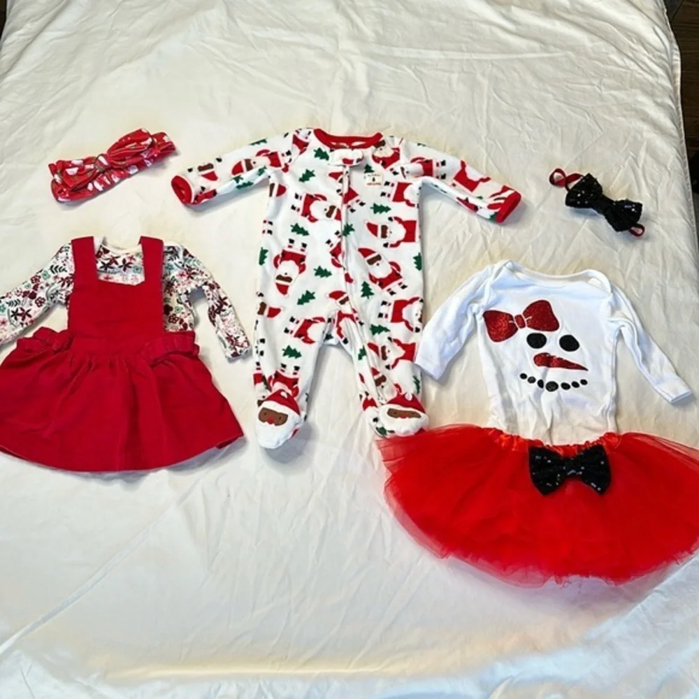 Carter’s baby girl Christmas bundle. One pair of fleece footed pajamas, one tutu